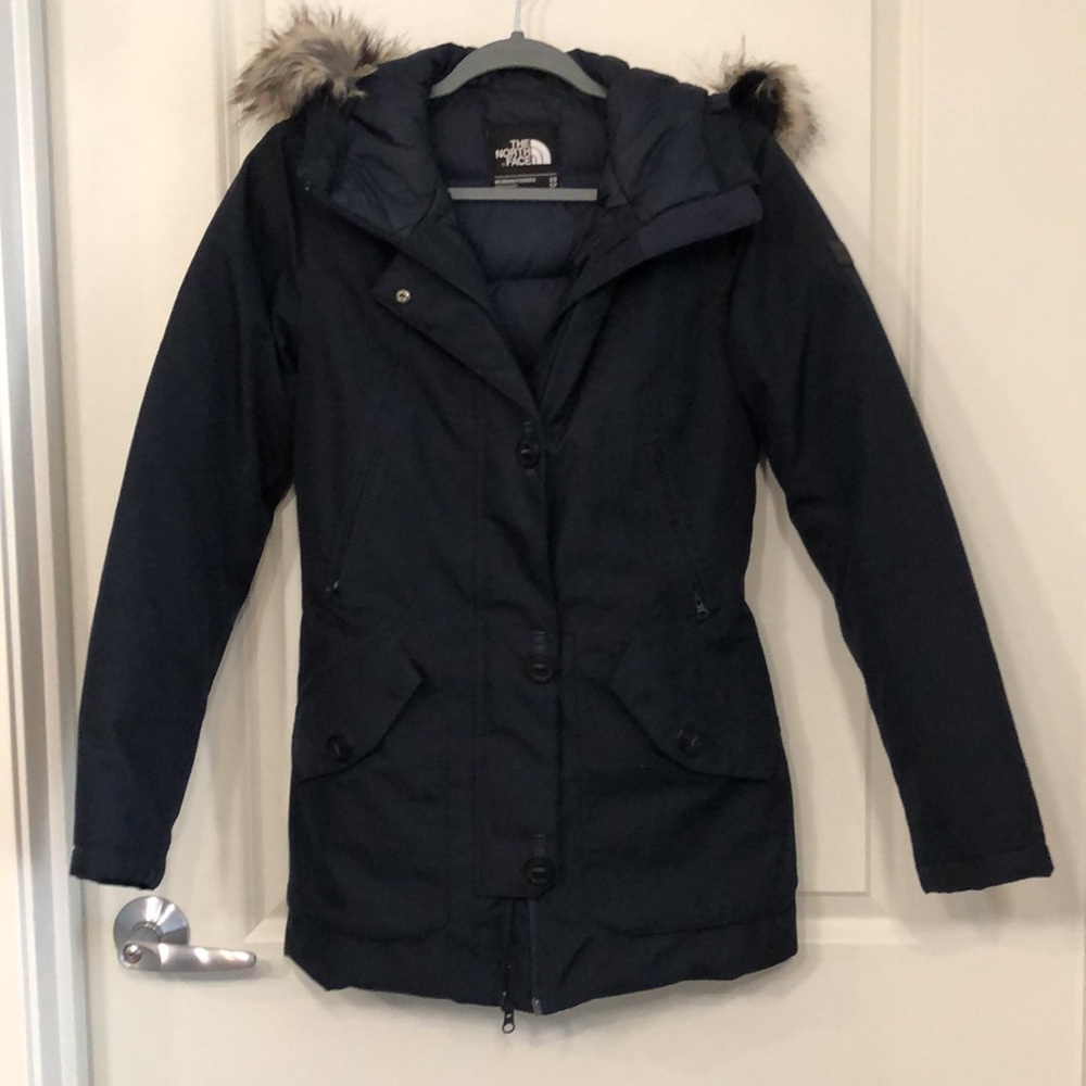 The North Face winter parka, padded parka.